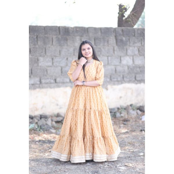 "Enchanting Elegance: Layered Full Gher Indian Gown" on rent