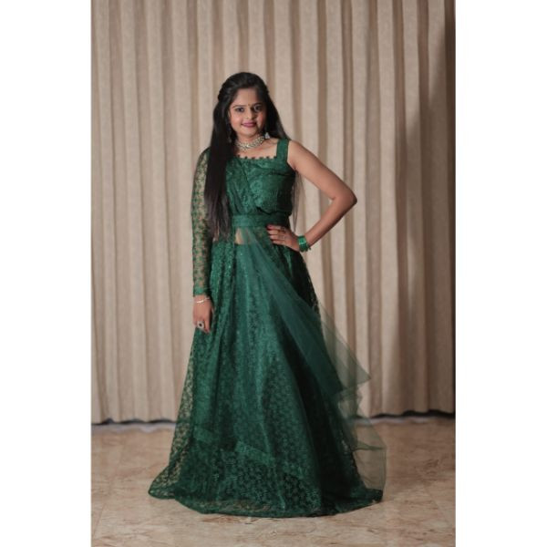"Emerald Elegance: Green Designer Choli with Lehenga & Belt" on rent