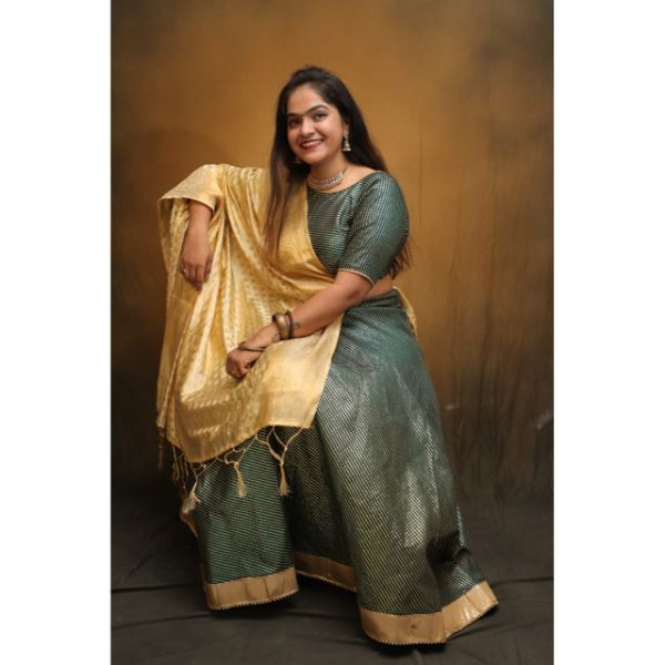 "Enchanting Emerald: Green and Golden Choli With Lehenga for Rent" on rent