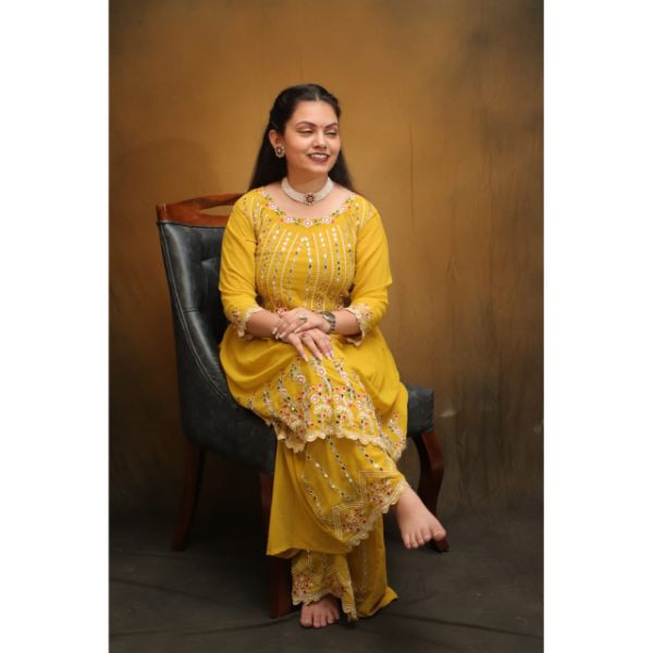 "Radiant Sunshine: Yellow Sharara Haldi Outfit"
 on rent