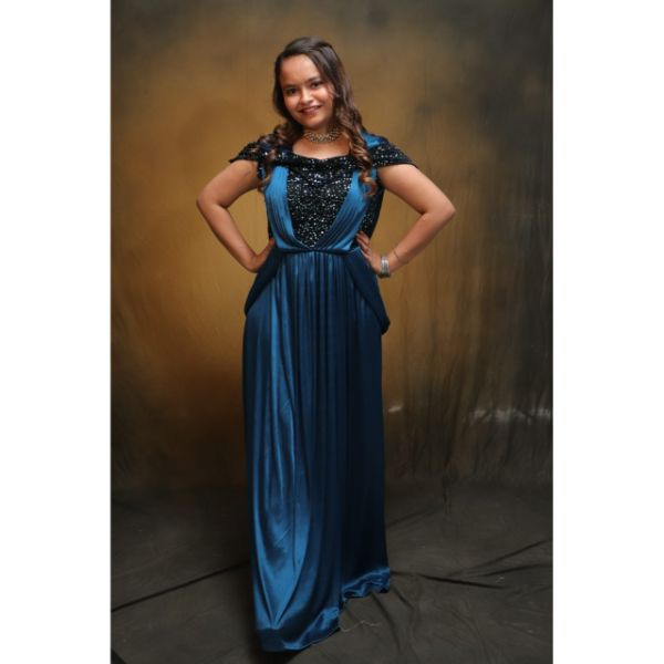 "Sparkling Sapphire: Blue Sequined Gown for Party Rental"
 on rent