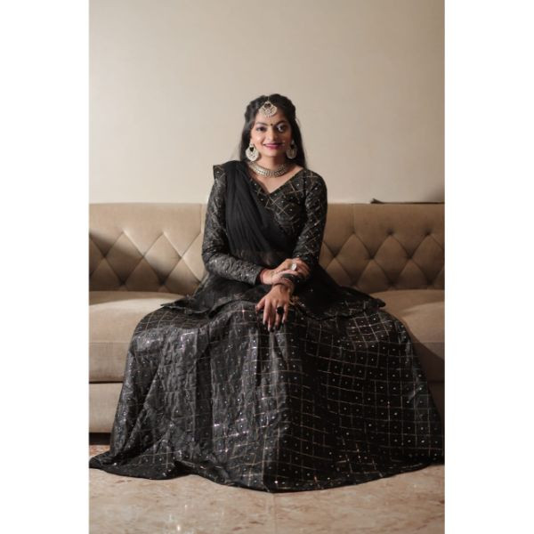 "Elegance Personified: Black Sequence Choli with Lehenga & 2 Dupattas" on rent